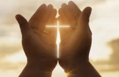 Cross in hands