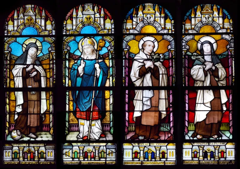 Stained glass window with six Carmelite Saints